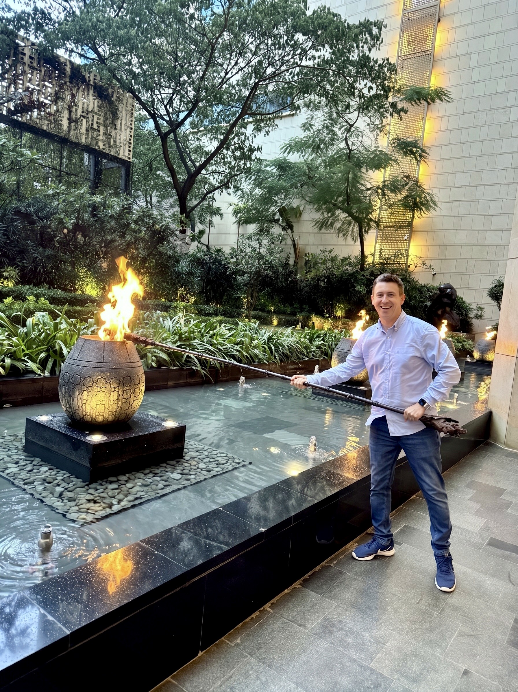 Andy lighting a ceremonial torch at The Ritz-Carlton, Bengaluru